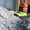 Stena Recycling expert examining a container with recycled plastic